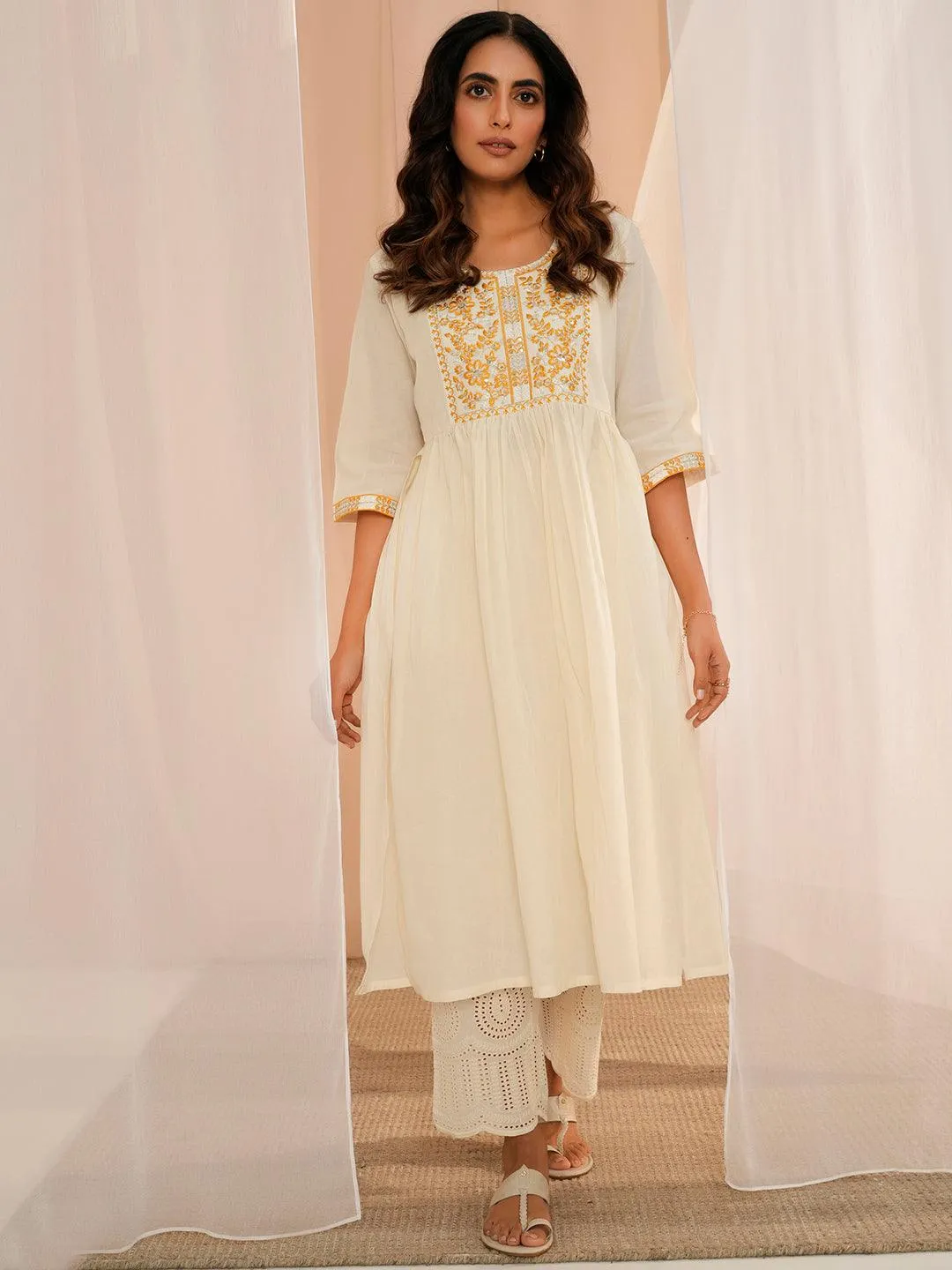 1_8dbe6bb8-d039-40e7-89f6-ba4cc6889295.webp Off White Yoke Design Cotton A-Line Kurta - Image 1